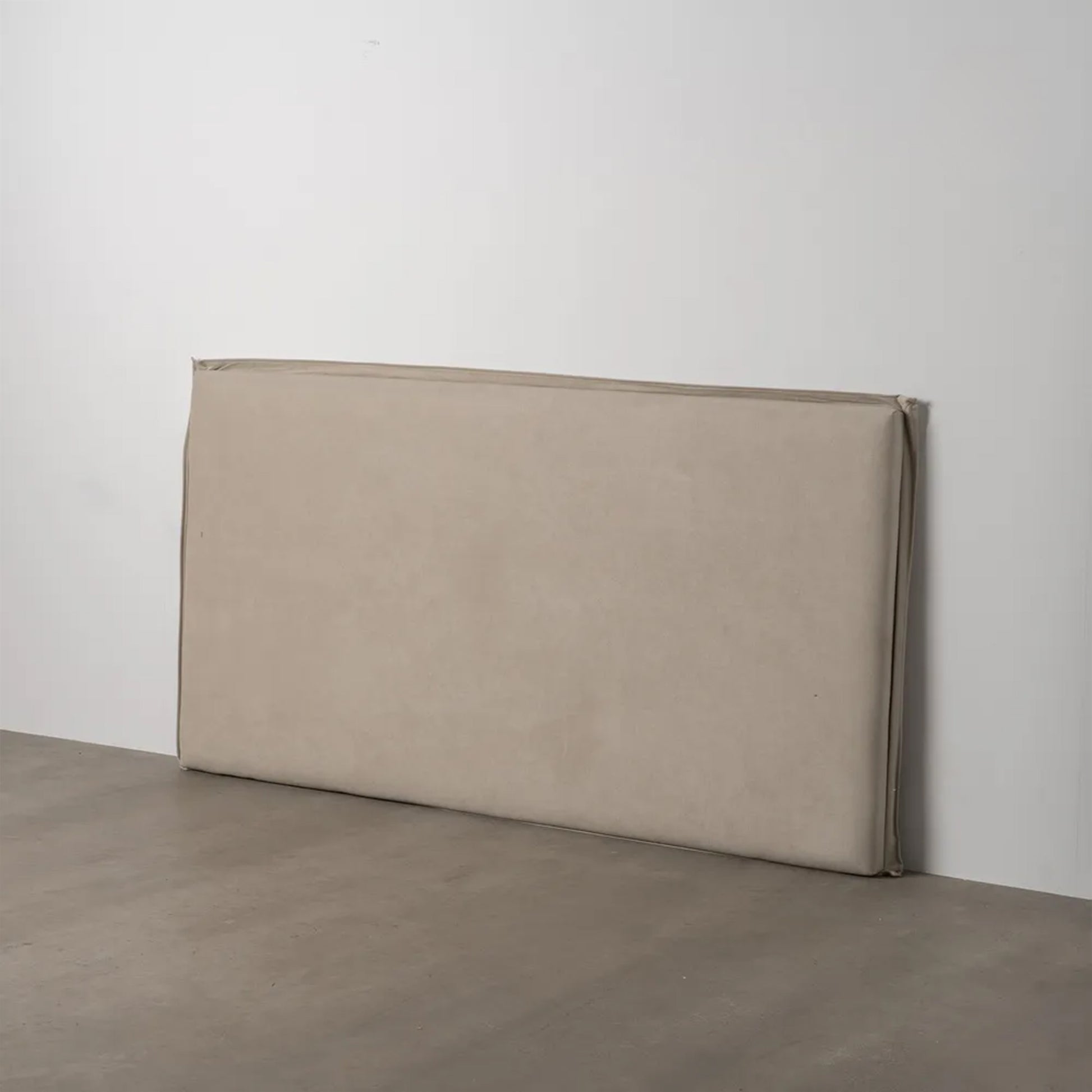 Antonella beige upholstered headboard, 190 cm wide, soft padded minimalist design for king or queen-size beds