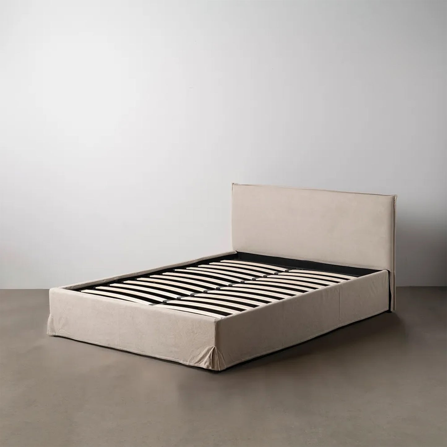 Rafael beige fabric storage bed with minimalist headboard and lift-up slatted frame