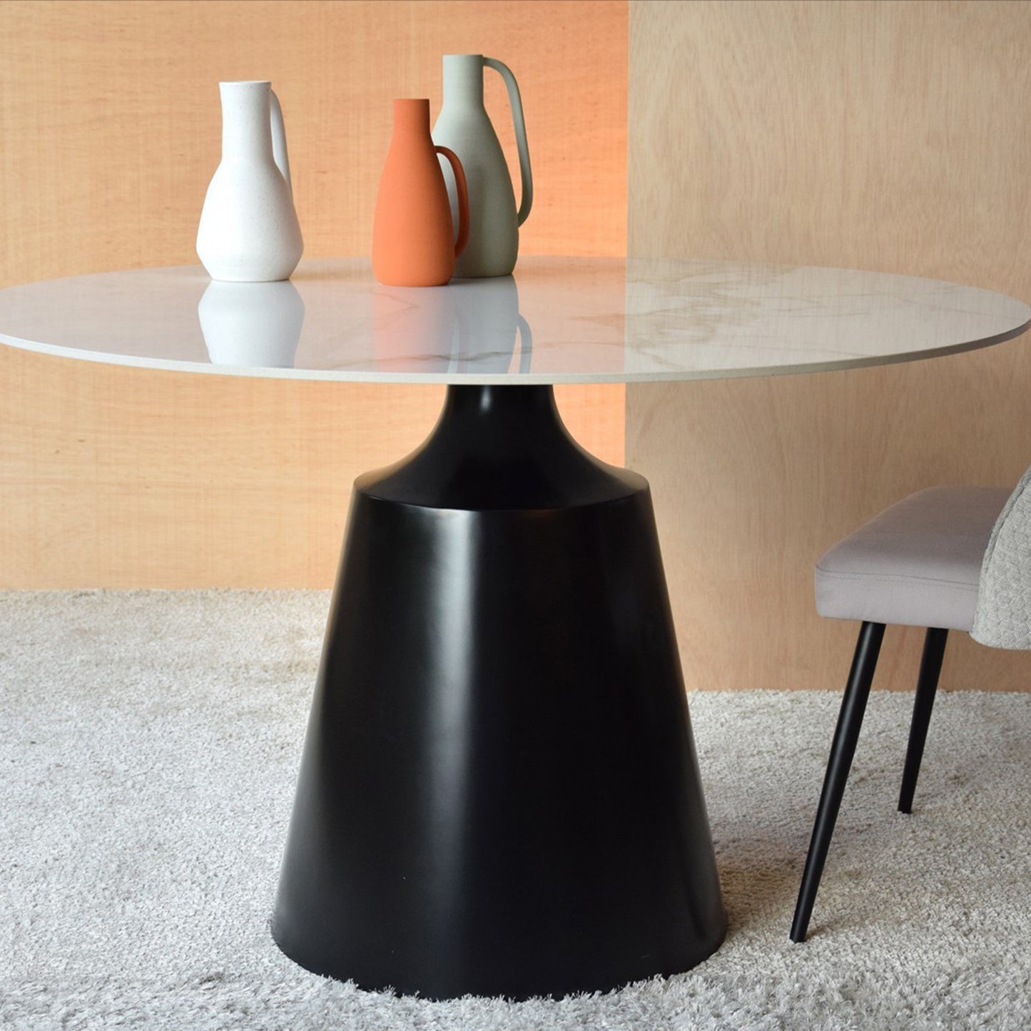 Matias round dining table with white ceramic marble top and matte black conical base
