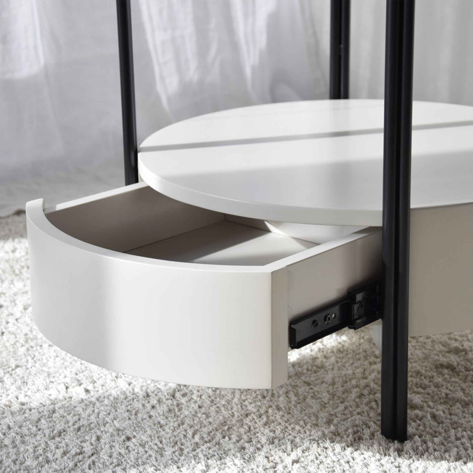 Luca Ceramic Marble White Side Table with round top, black legs, and sand grey drawer base
