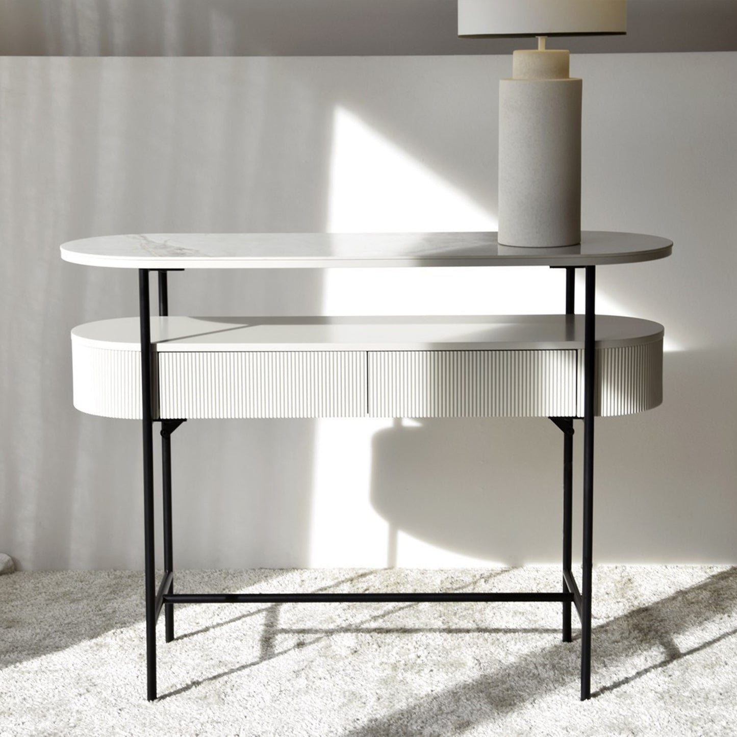 Javier White Ceramic Console Table with black metal frame and grooved drawer front