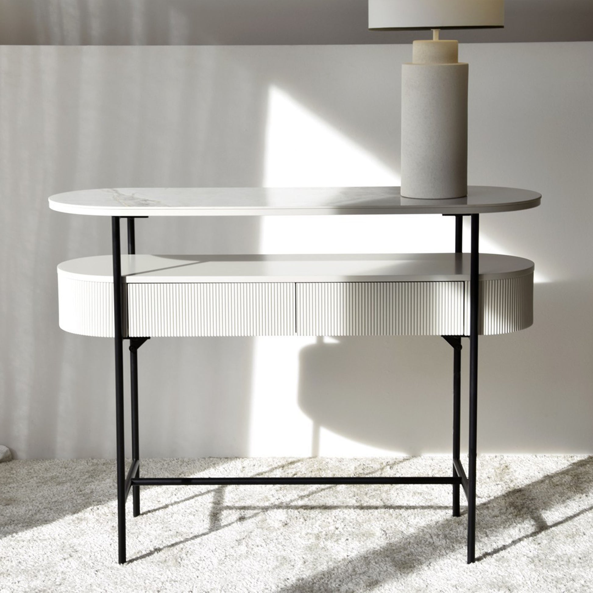 Javier White Ceramic Console Table with black metal frame and grooved drawer front
