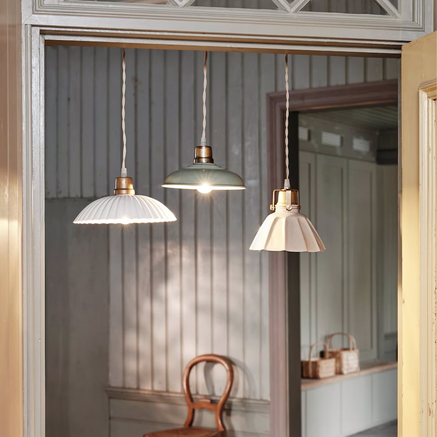 Triana pendant lamp with beige fluted iron shade and brass fixture