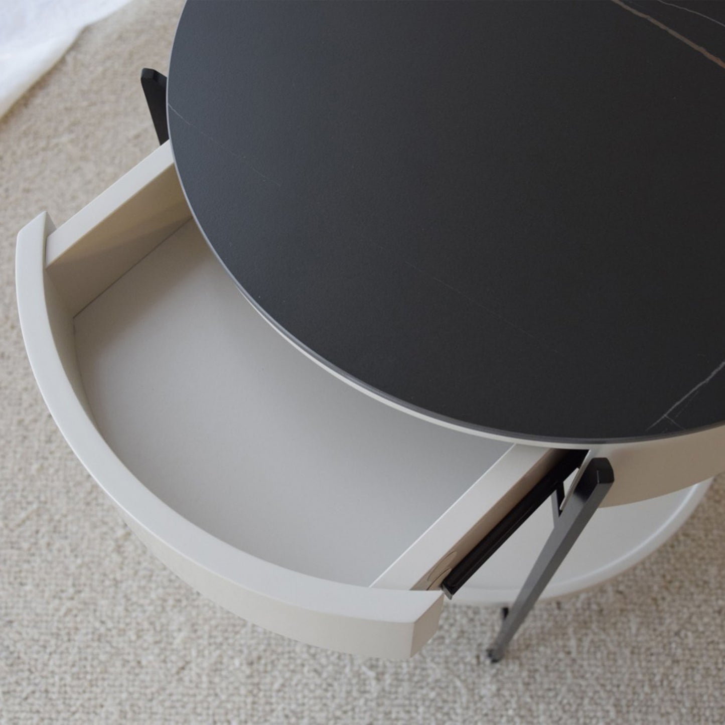 José Black Sintered Stone Side Table with matte black frame, drawer, and shelf