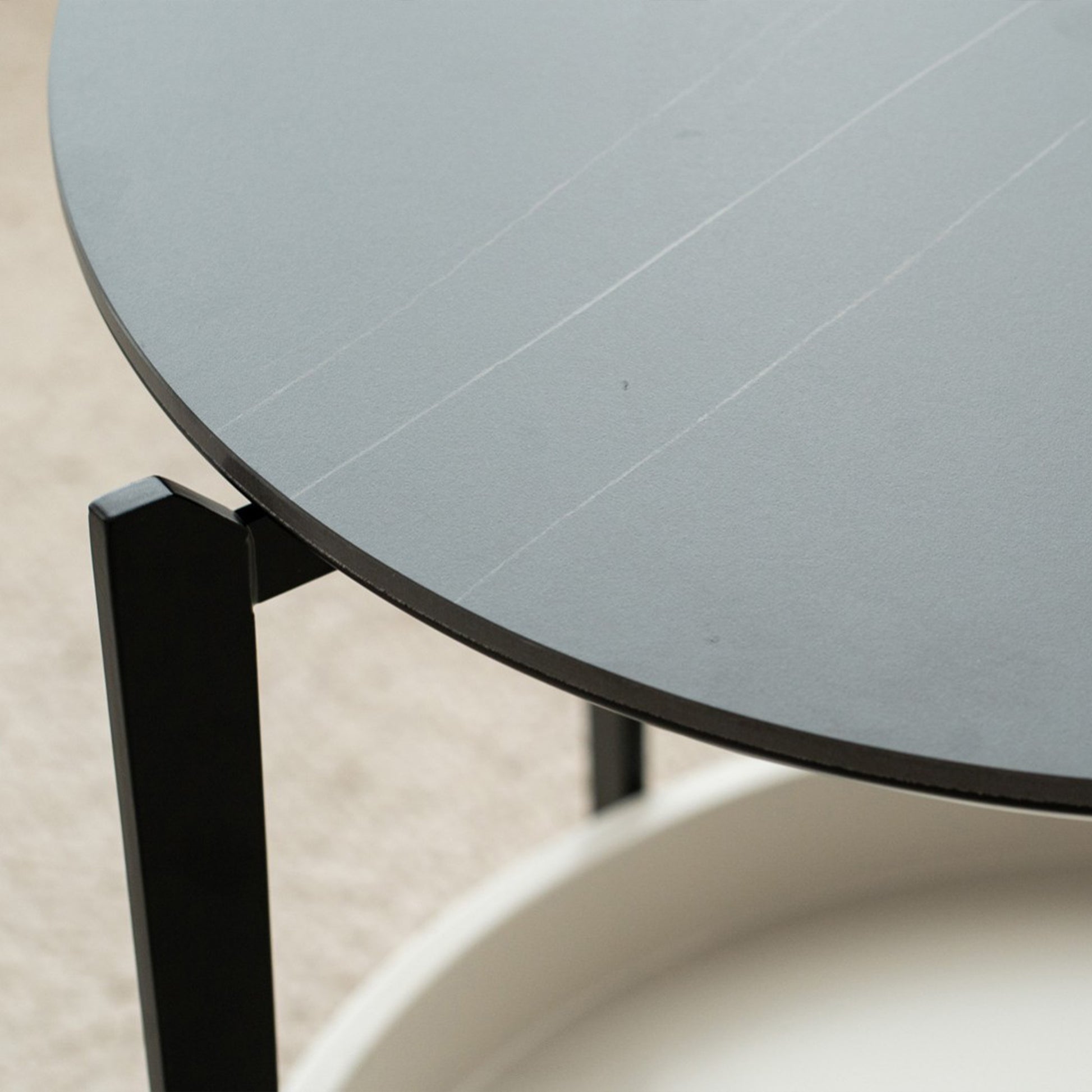 Miguel Side Table with matte black metal legs and grey ceramic marble top
