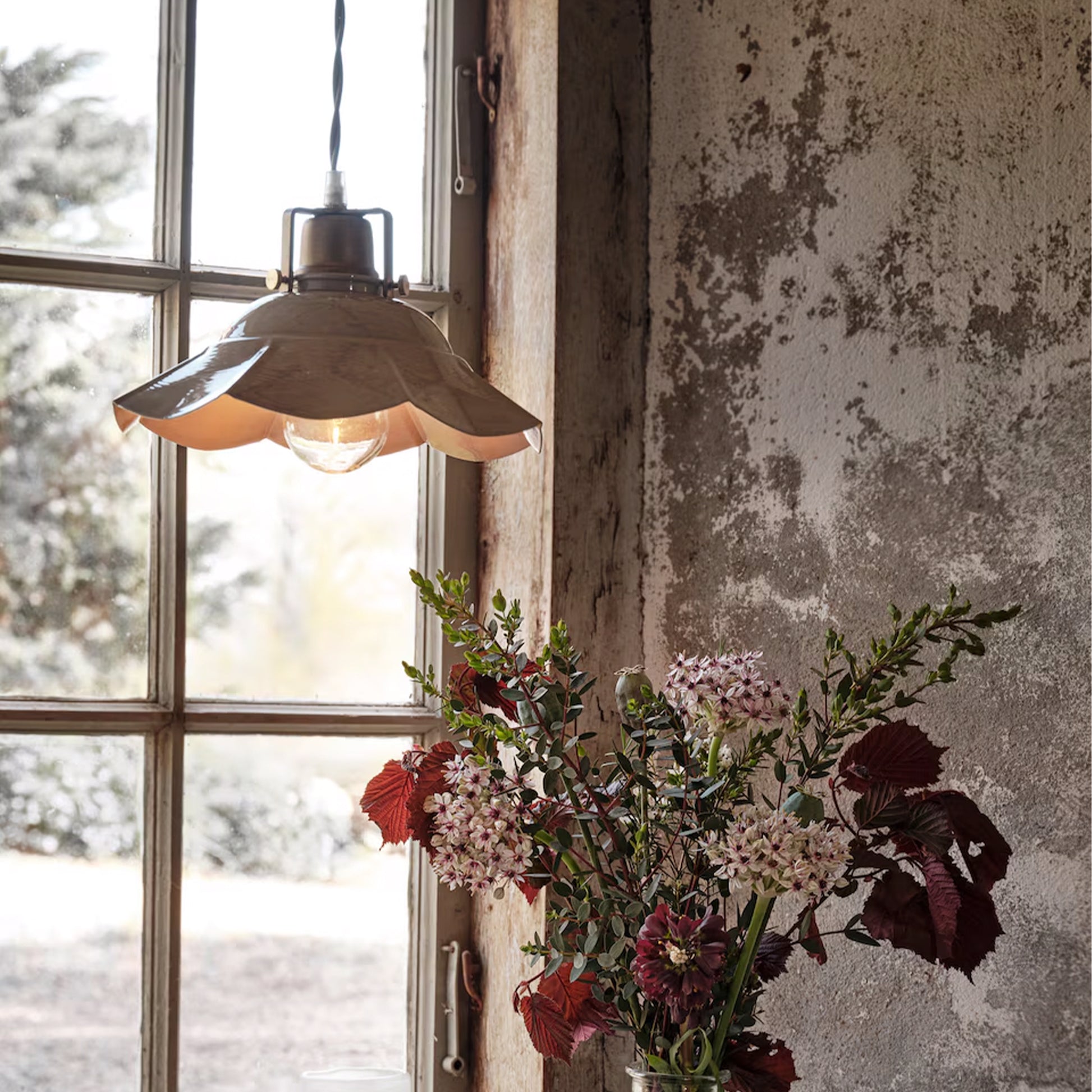 Paloma beige pendant lamp with scalloped iron shade and brass accents from AK Interior Living