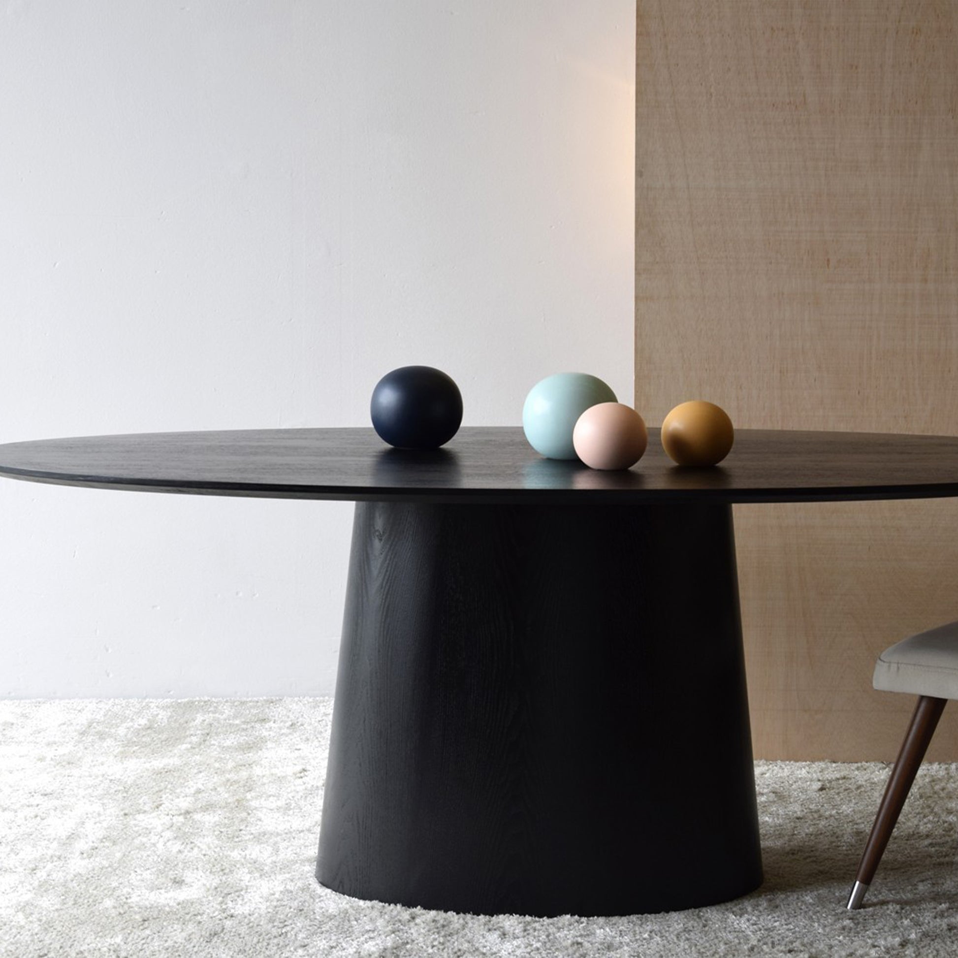 Black Ash Oval Dining Table with matte wood finish and sculptural base – 200cm wide
