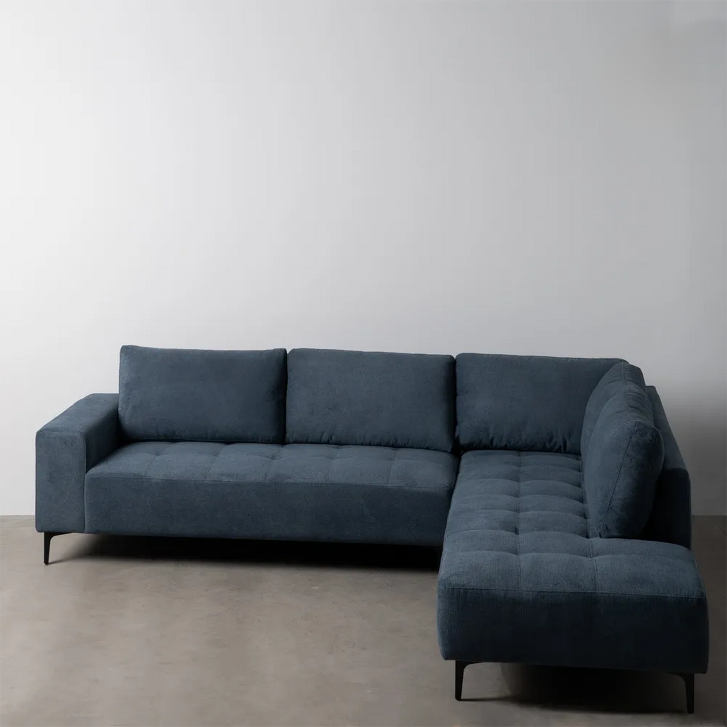 Mario Right Chaise Longue Sofa Blue with deep seats, L-shape design, and slim black legs