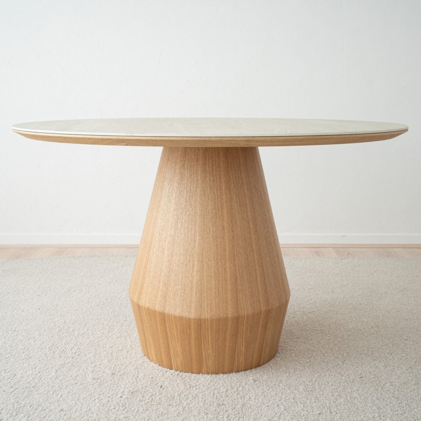 Mateo round dining table with ceramic marble top and natural ash wood conical base