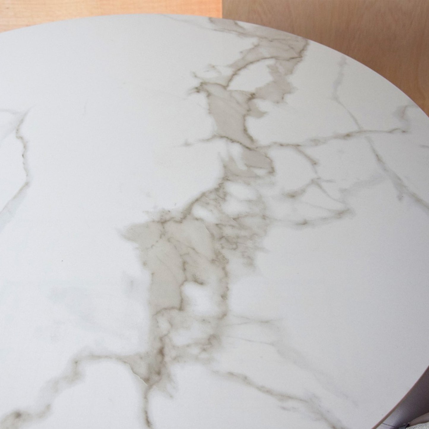 Matias round dining table with white ceramic marble top and matte black conical base