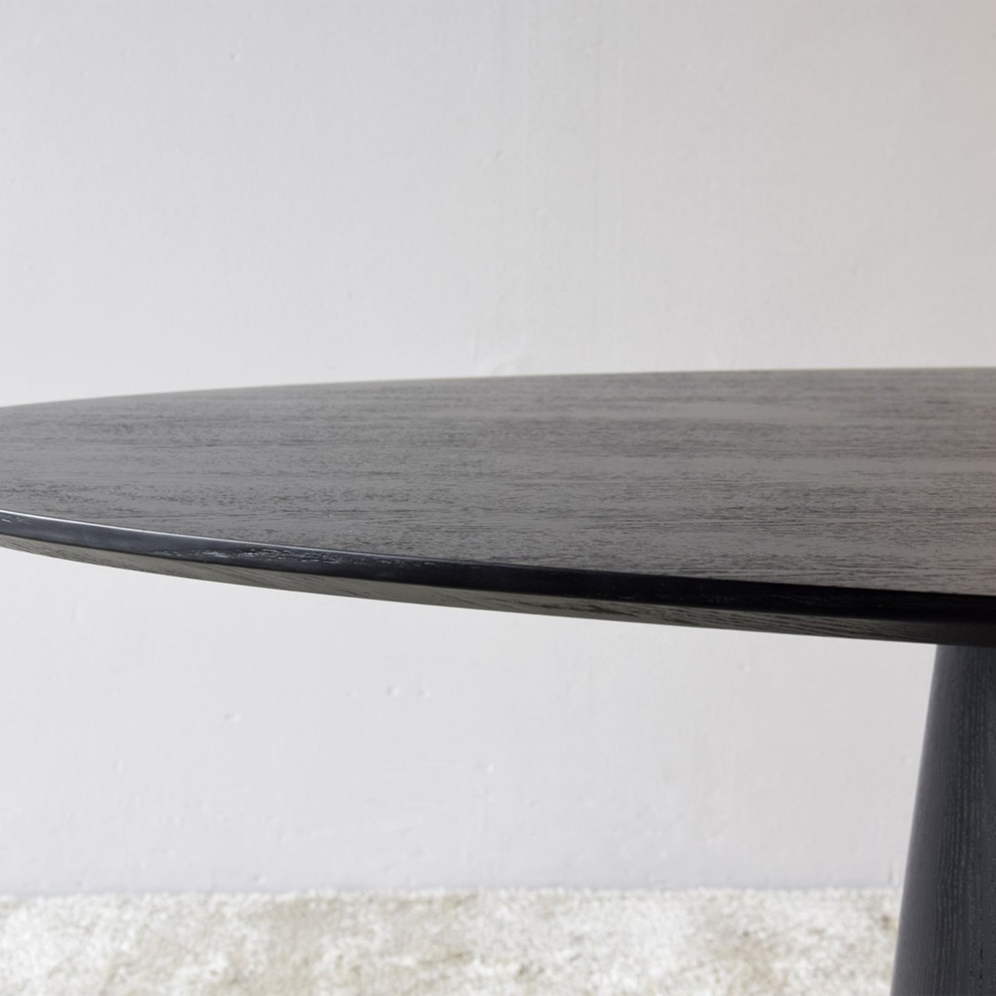 Black Ash Oval Dining Table with matte wood finish and sculptural base – 200cm wide