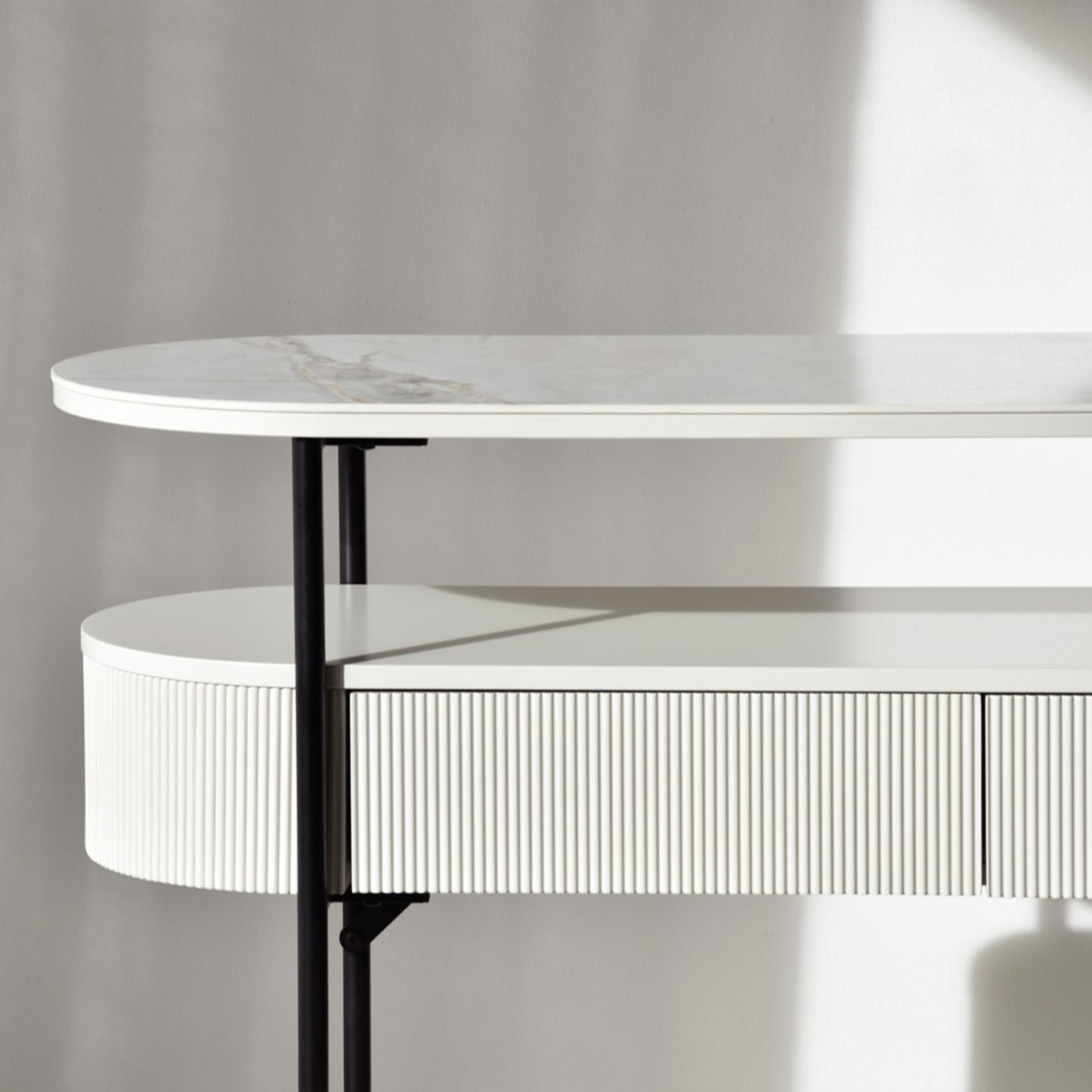 Javier White Ceramic Console Table with black metal frame and grooved drawer front
