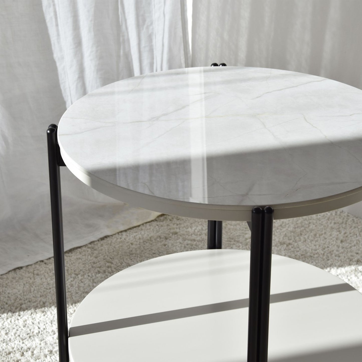Luca Ceramic Marble White Side Table with round top, black legs, and sand grey drawer base