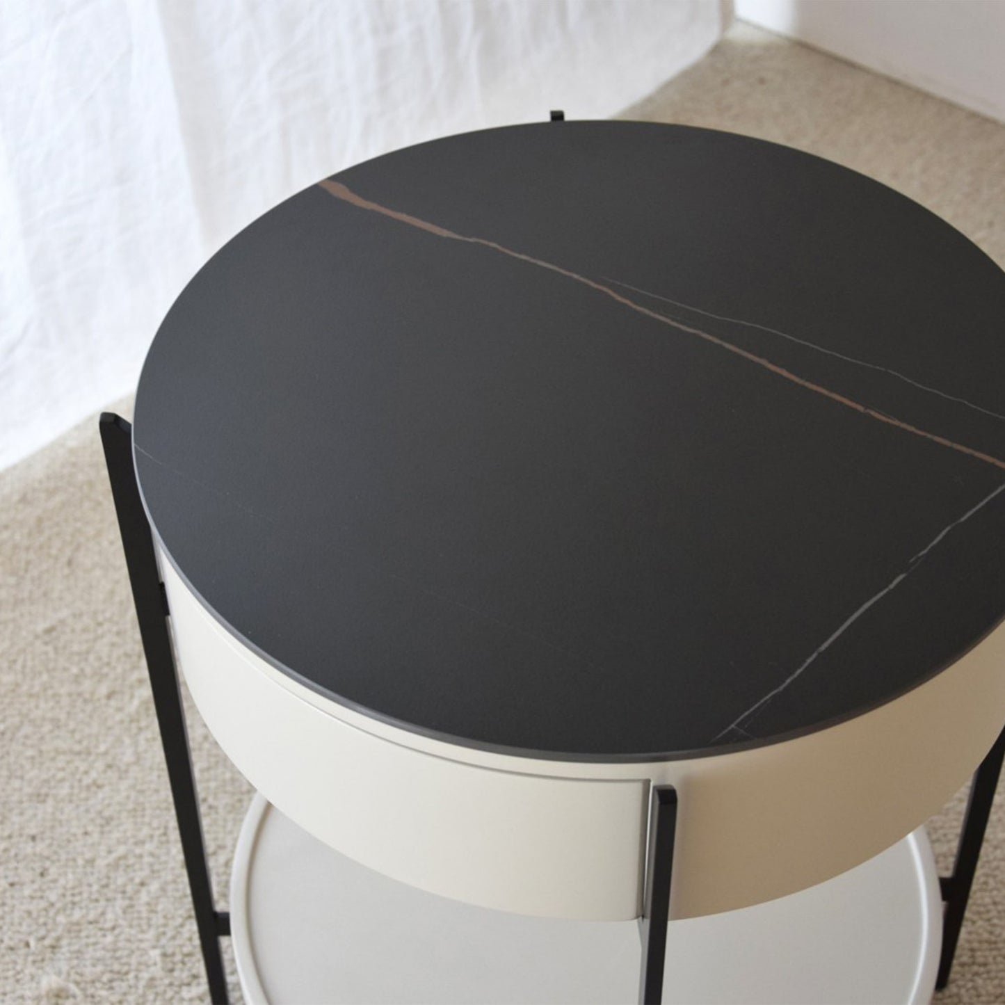José Black Sintered Stone Side Table with matte black frame, drawer, and shelf