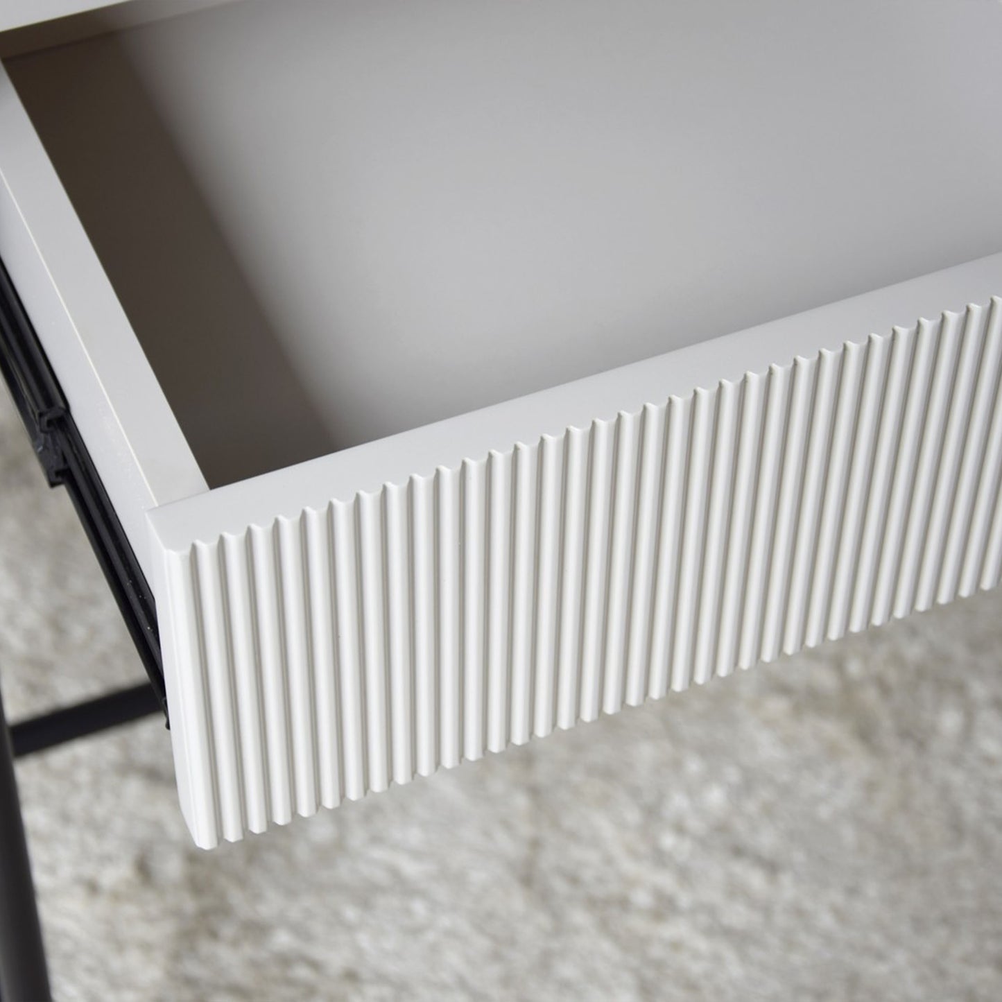 Izan Sintered Stone Black Console Table with ribbed drawer and black matte metal frame