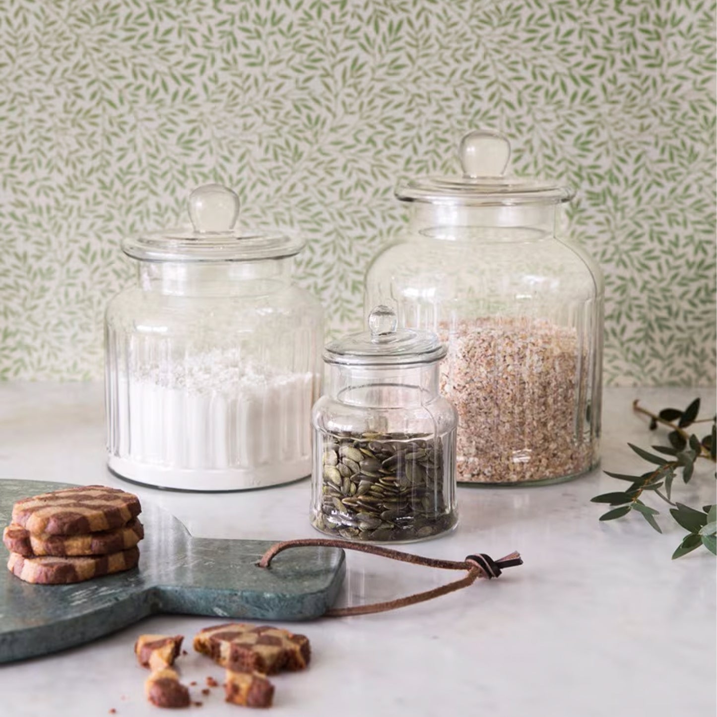 Vera Glass Jar Set – clear ribbed glass storage jars with elegant lids, available in small, medium, and large sizes.