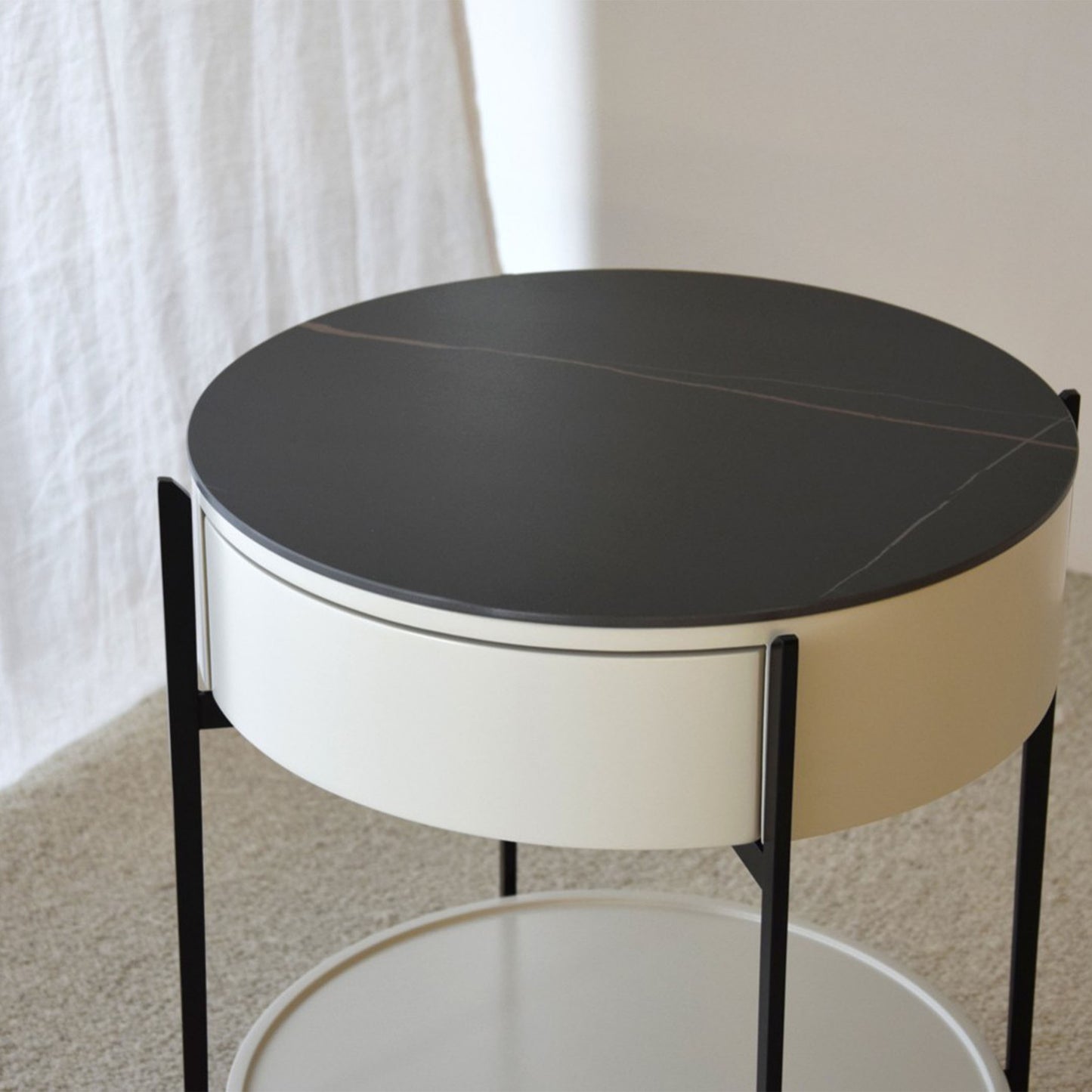 José Black Sintered Stone Side Table with matte black frame, drawer, and shelf