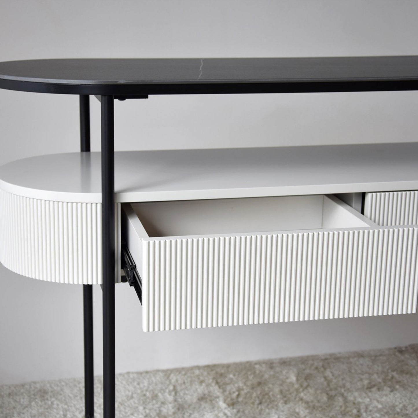 Izan Sintered Stone Black Console Table with ribbed drawer and black matte metal frame