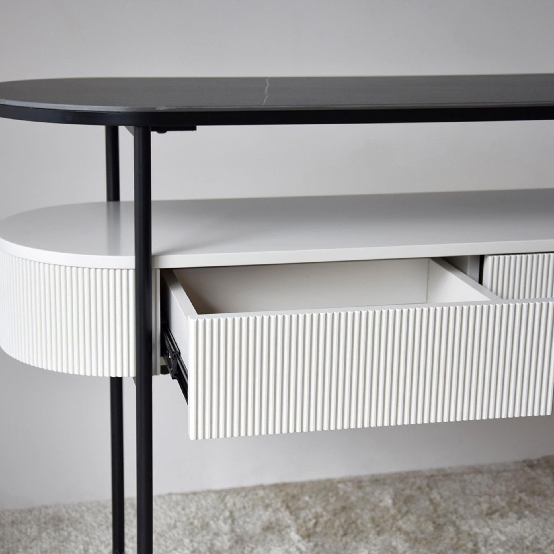 Izan Sintered Stone Black Console Table with ribbed drawer and black matte metal frame