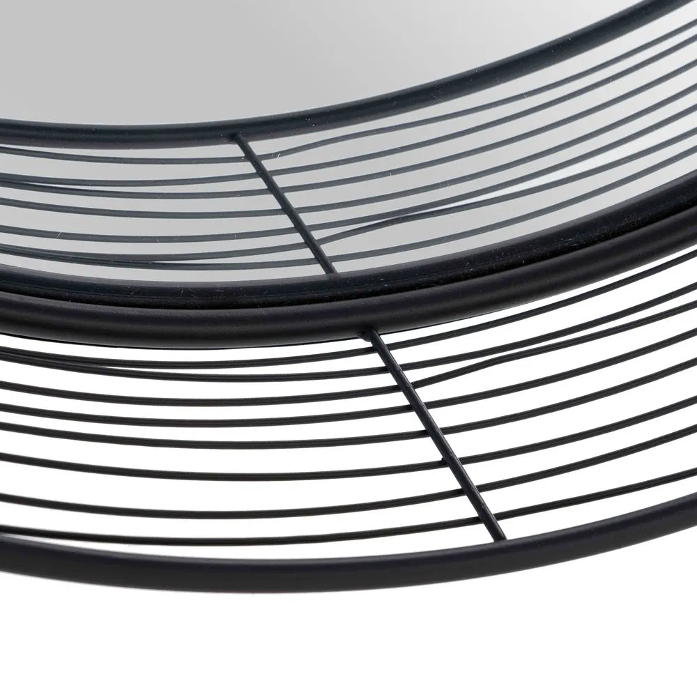 Paula black metal circular mirror in a modern decor setting