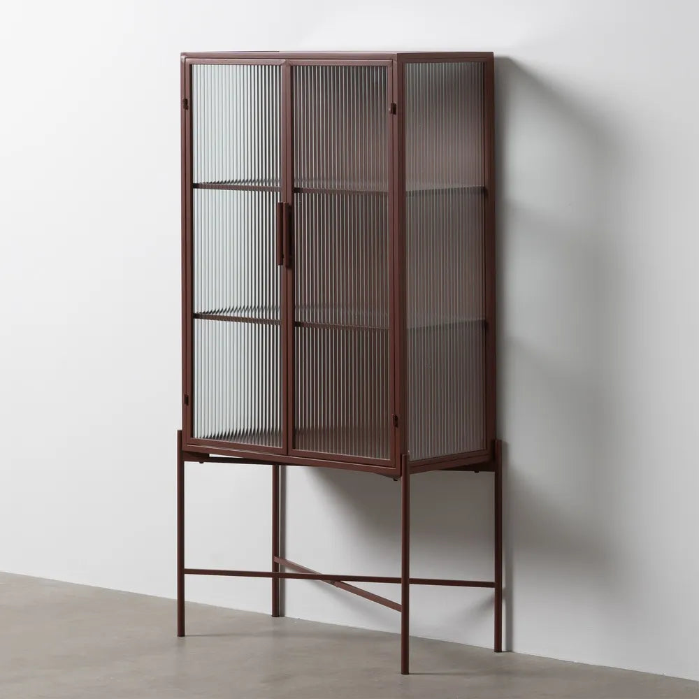 Pablo showcase cabinet with tile-colored metal frame and ribbed glass doors in modern interior