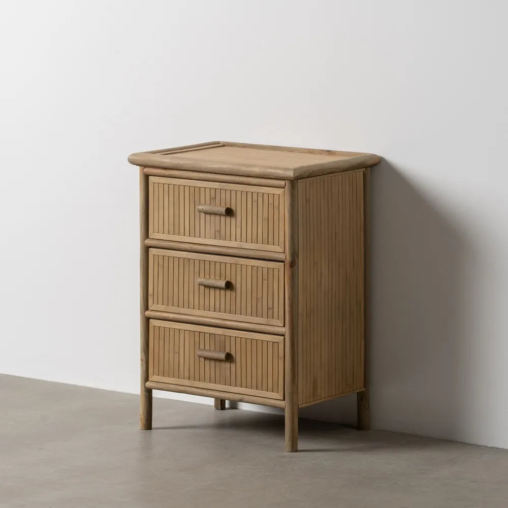 Mateo natural bamboo side table with three drawers in minimalist room