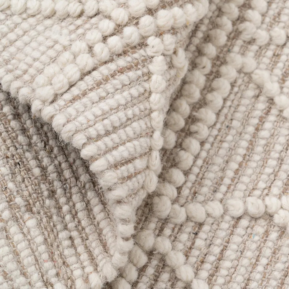 Maria cream fabric carpet with geometric pattern in living space