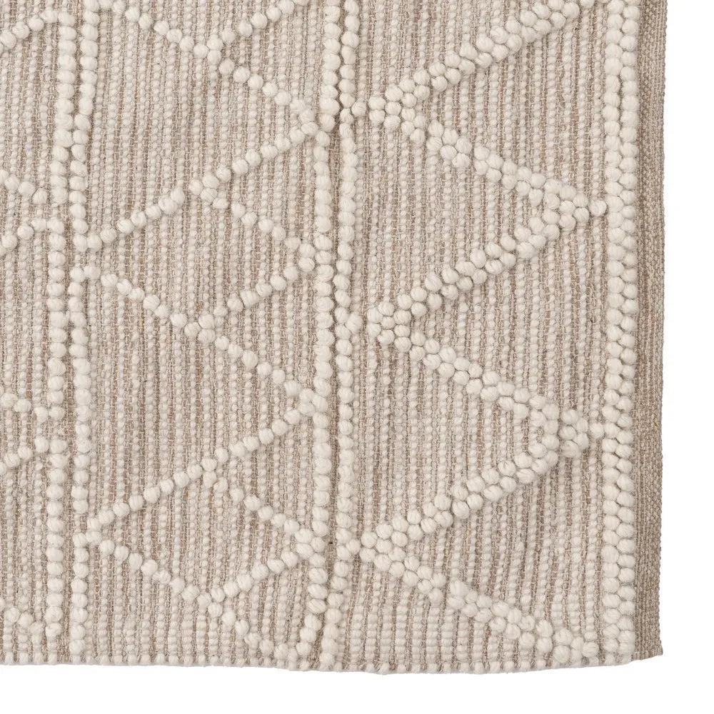 Maria cream fabric carpet with geometric pattern in living space