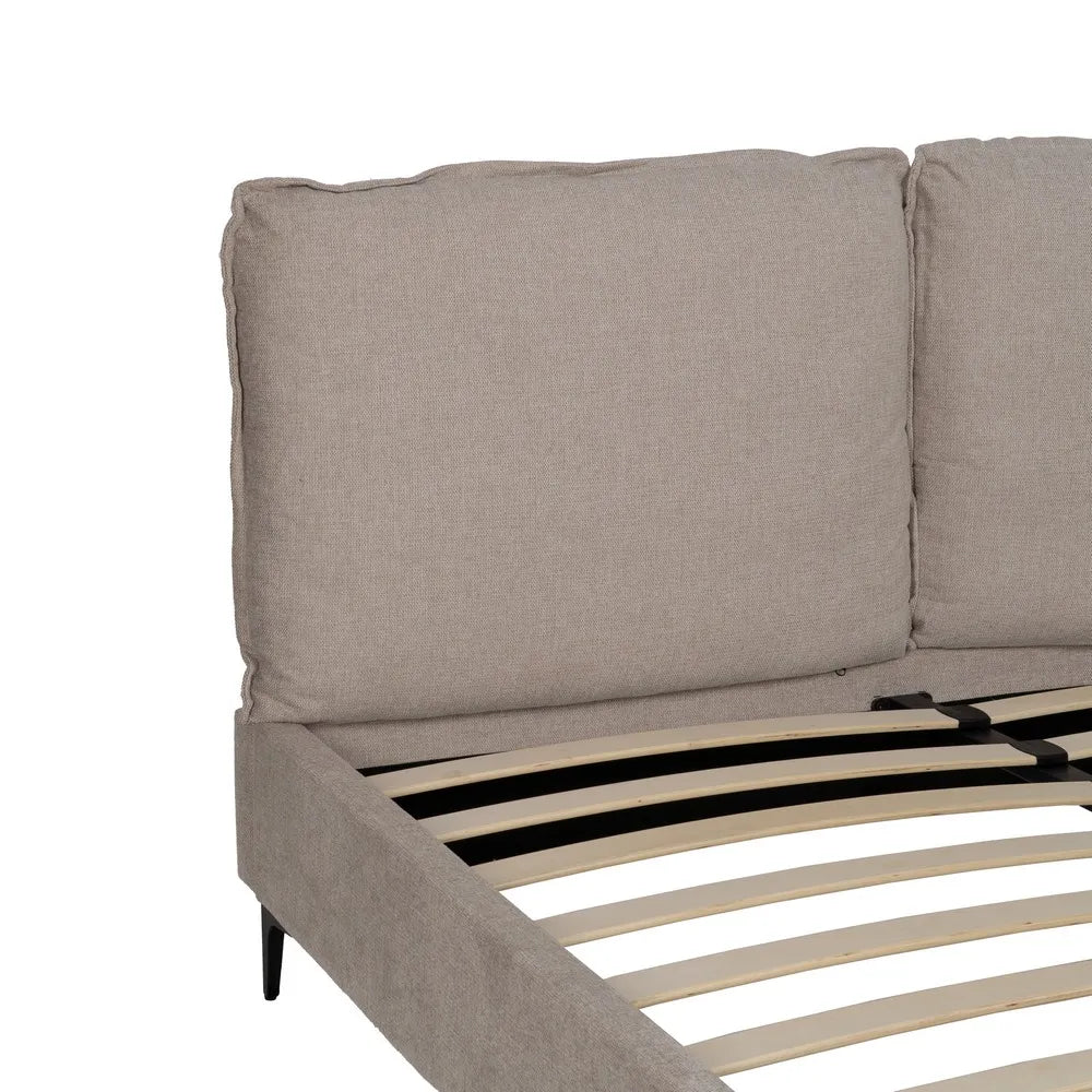 Nil upholstered bed in beige fabric with soft headboard and black metal legs