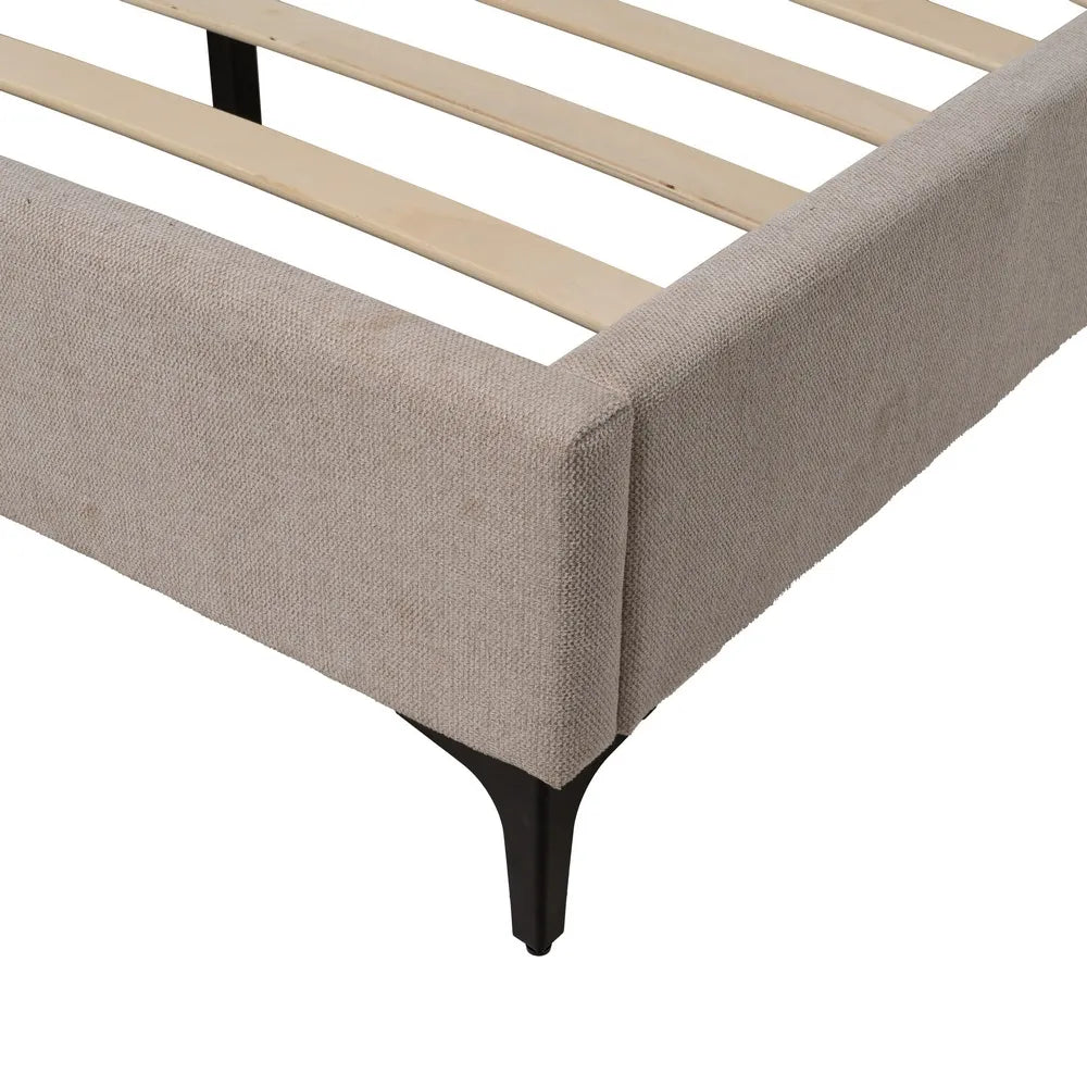 Nil upholstered bed in beige fabric with soft headboard and black metal legs