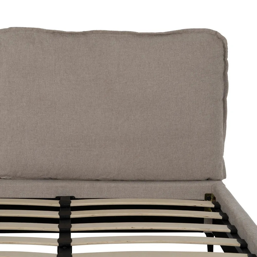 Pablo king size upholstered bed with beige fabric, cushioned headboard and black metal legs