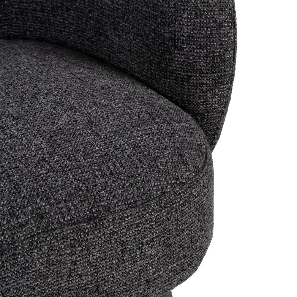 KAT fabric revolving armchair with curved backrest and rounded base from AK Interior Living