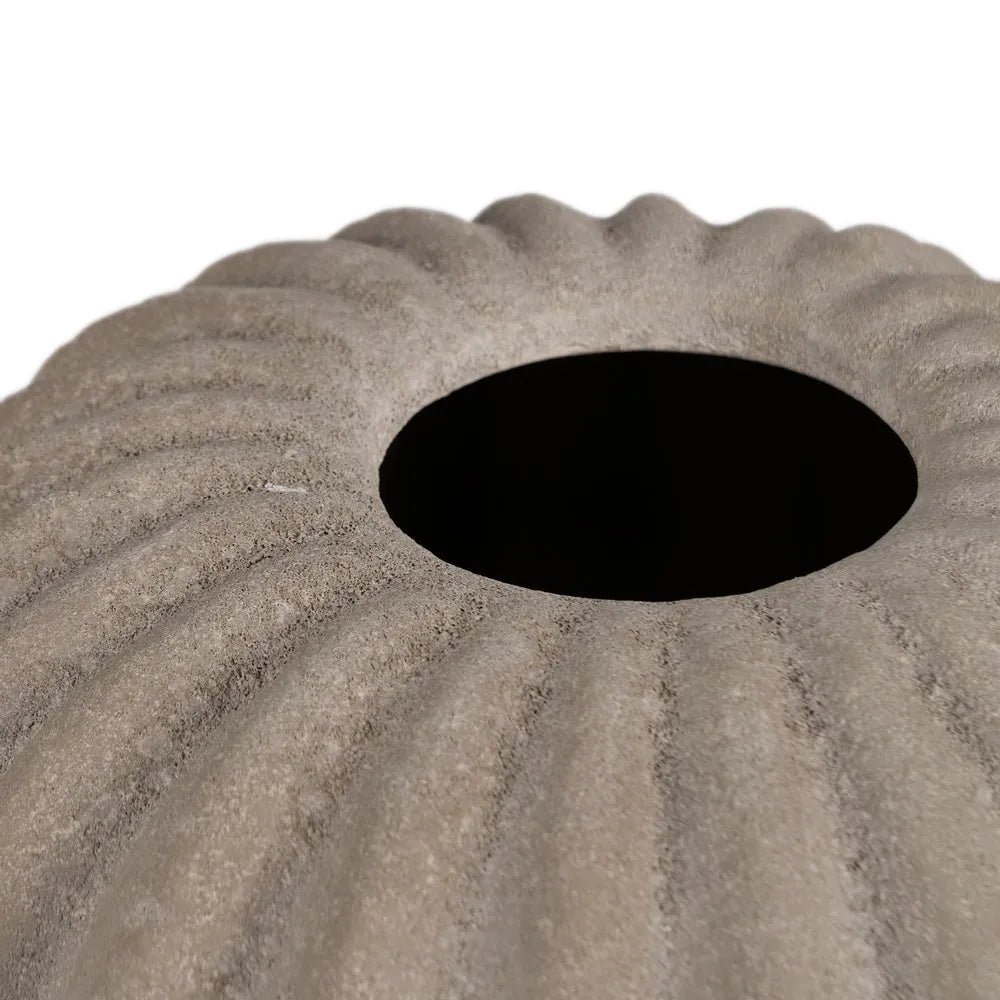 Aine dark grey ceramic vase with textured surface in a sophisticated setting