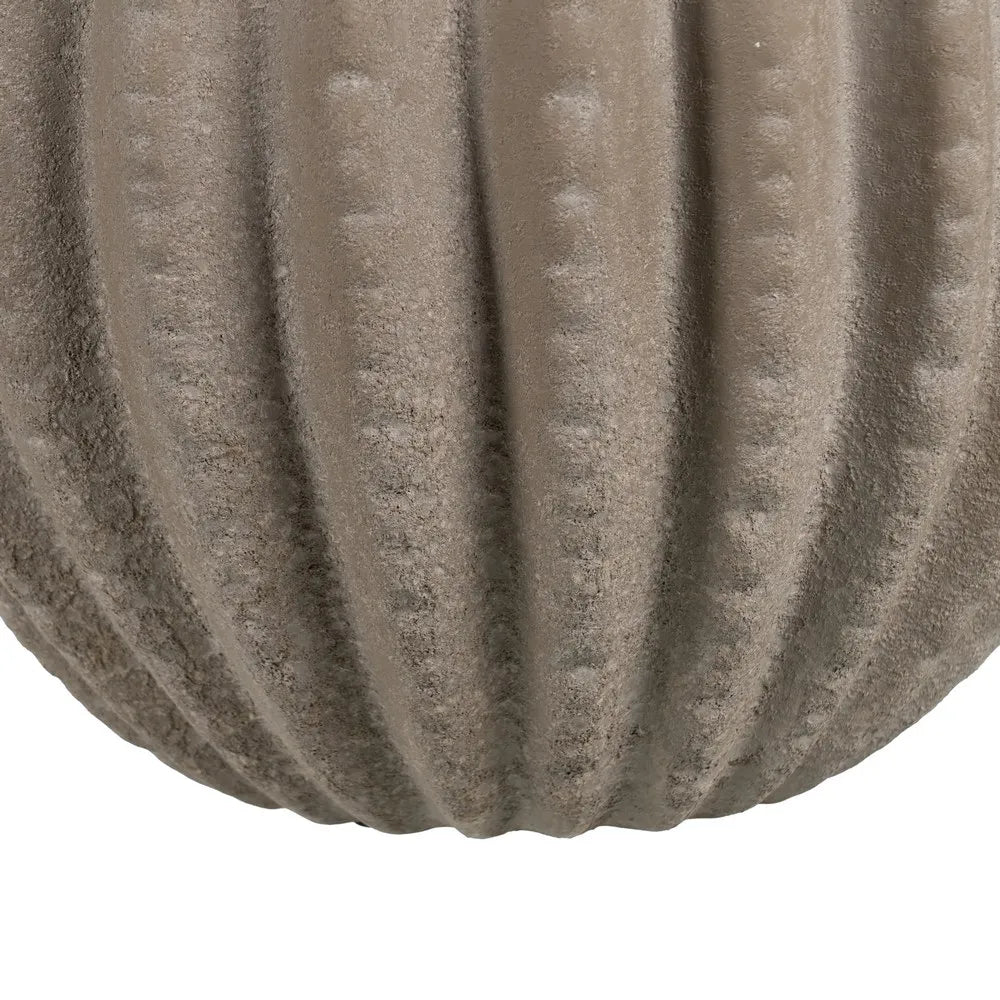 Aine dark grey ceramic vase with textured surface in a sophisticated setting
