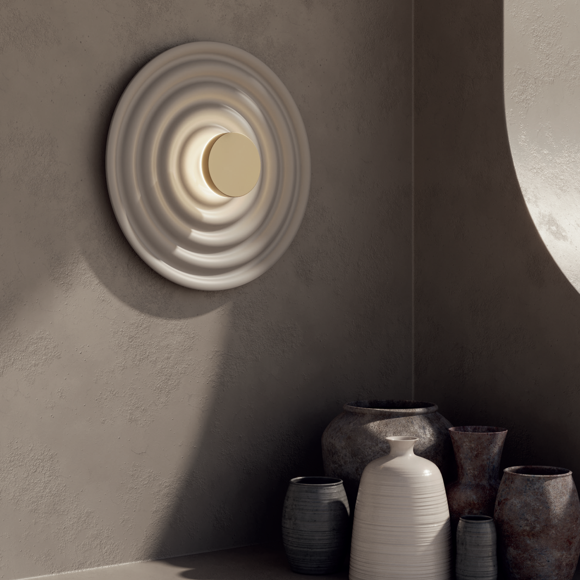 IDRIS Wall Light in white resin with matt brass center, offering sophisticated, modern lighting