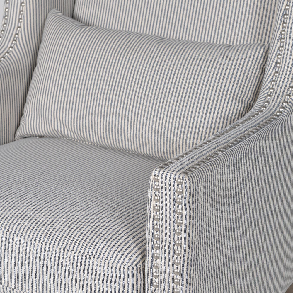 PRIYANKA Striped fabric chair with silver stud accents.