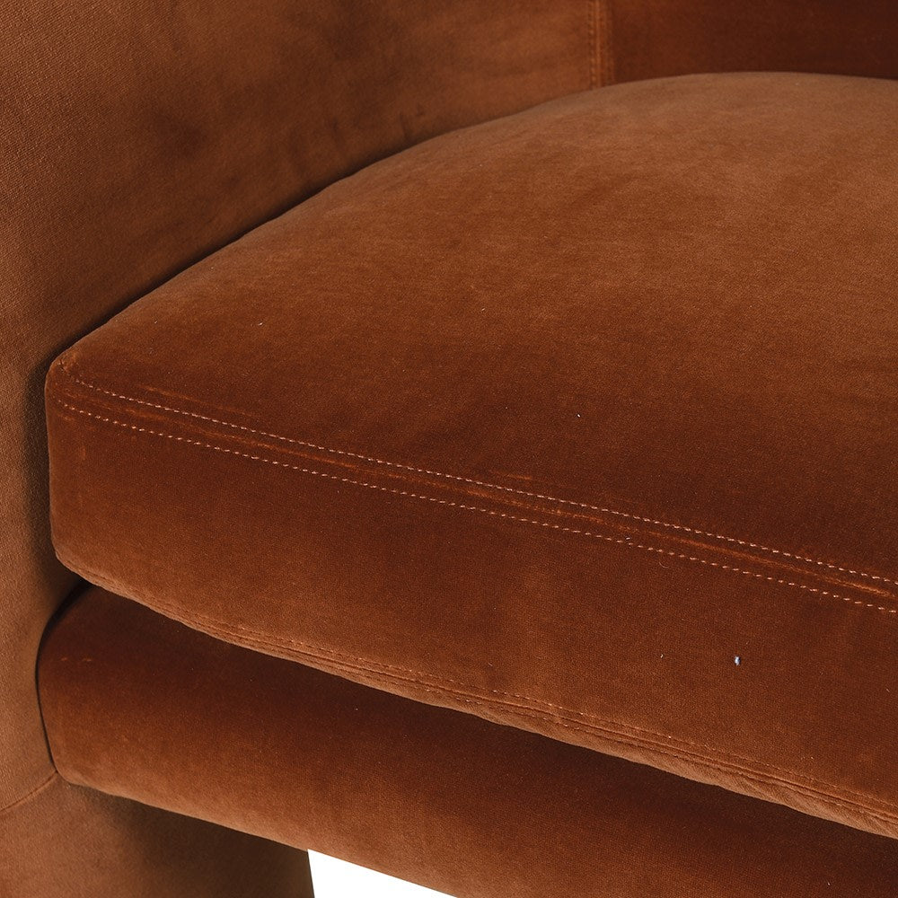 HENRY Amber Velvet Effie Chair with rich upholstery, modern design, and plush cushioning for comfort and elegance in any space.