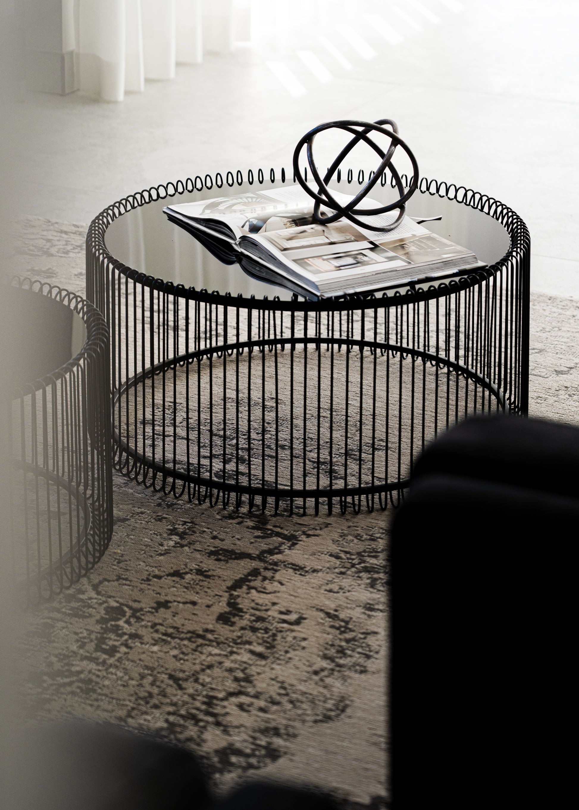 BEN Black Wire Coffee Table Set with glass tops and minimalist wireframe bases (set of 2).