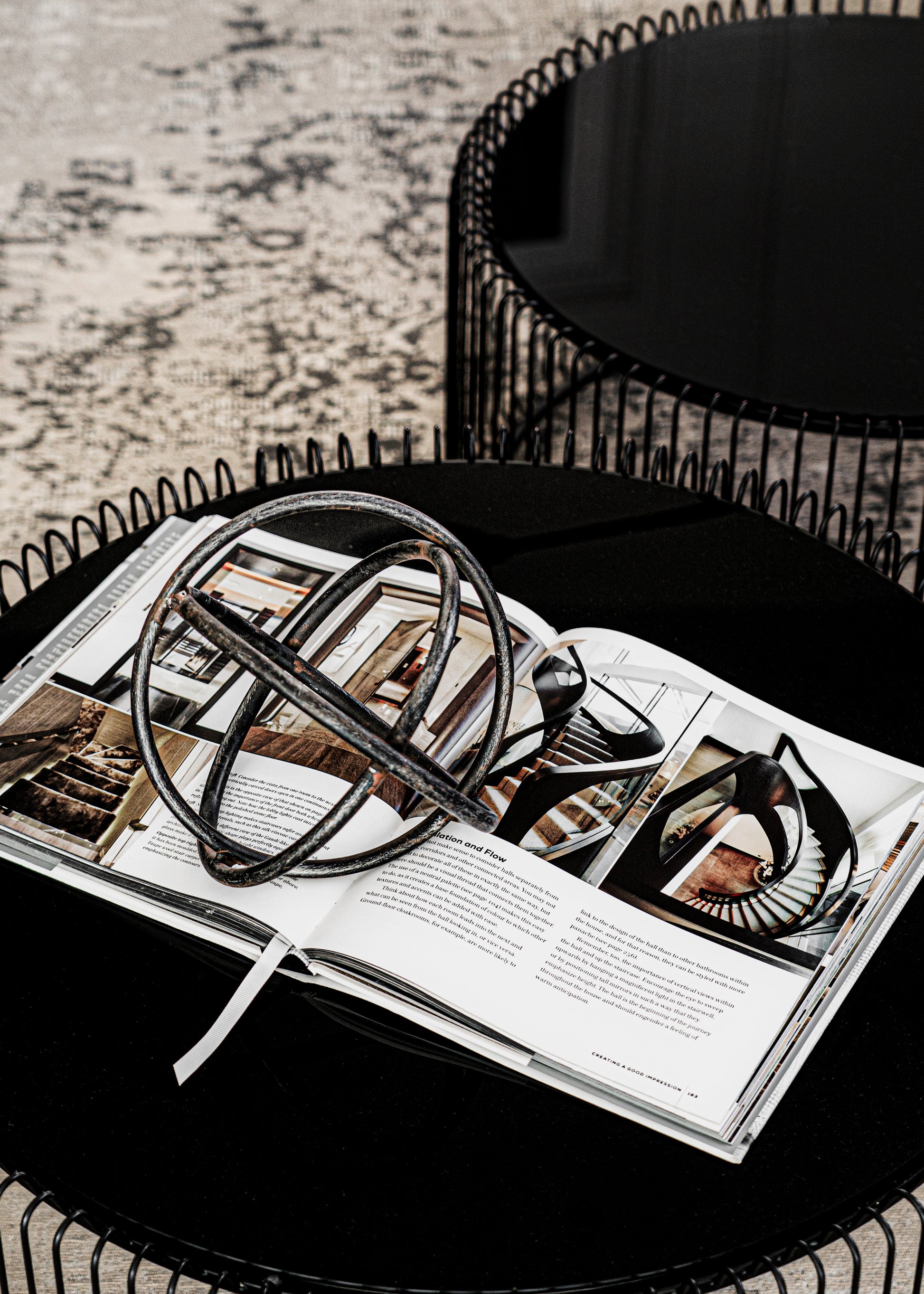 BEN Black Wire Coffee Table Set with glass tops and minimalist wireframe bases.