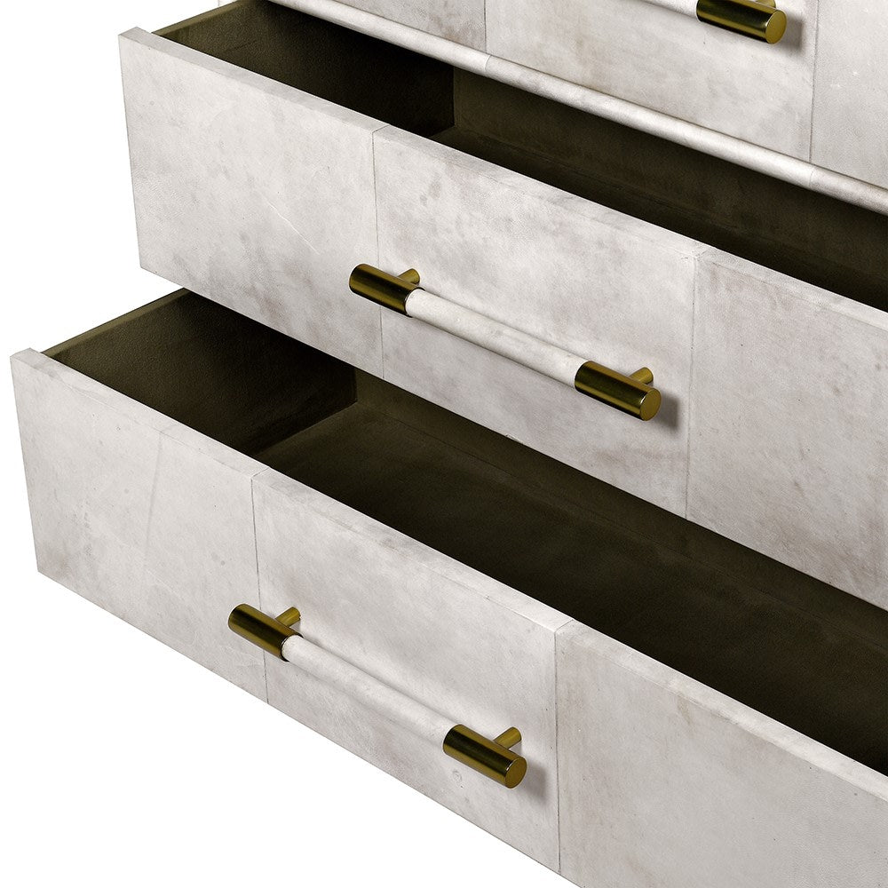 MILLIE Chest with 3 drawers, brass accents, and a luxurious neutral finish.