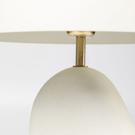 MARK White Table Lamp with a sculptural organic-shaped base and minimalist dome-shaped shade.