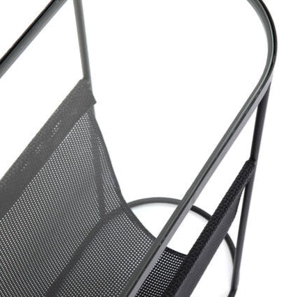 REY Journal Side Table with tempered glass top and black metal mesh pocket for storage.