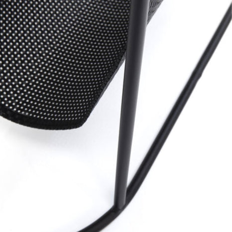 REY Journal Side Table with tempered glass top and black metal mesh pocket for storage.