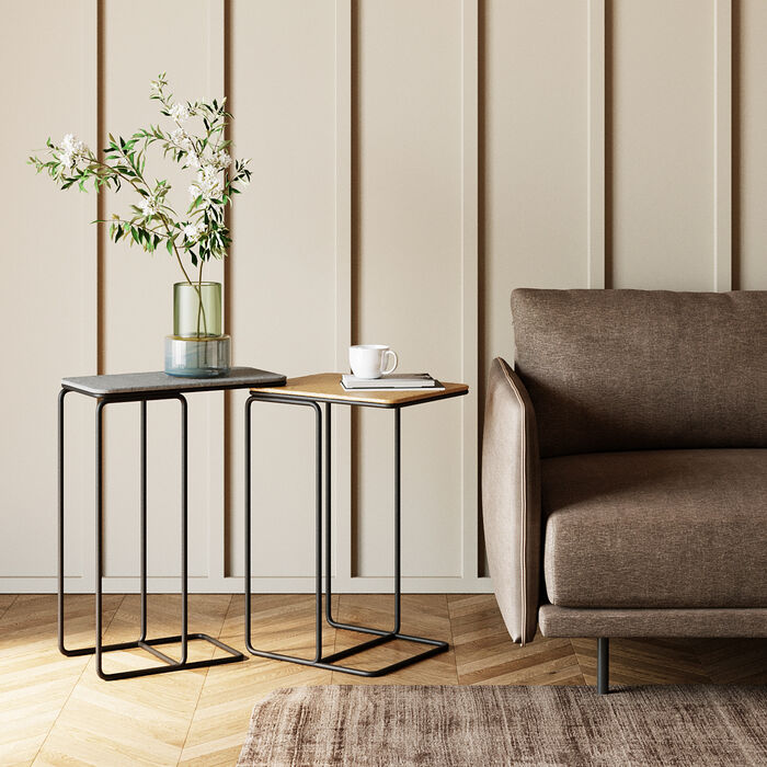 TRAVIS Set of 2 Side Tables with contrasting black and golden tops and sleek black metal frames.