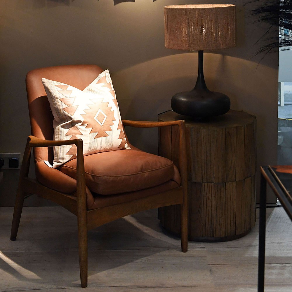 SANDRA leather armchair with solid oak frame, mid-century modern design, and premium padded cushions for luxurious comfort.