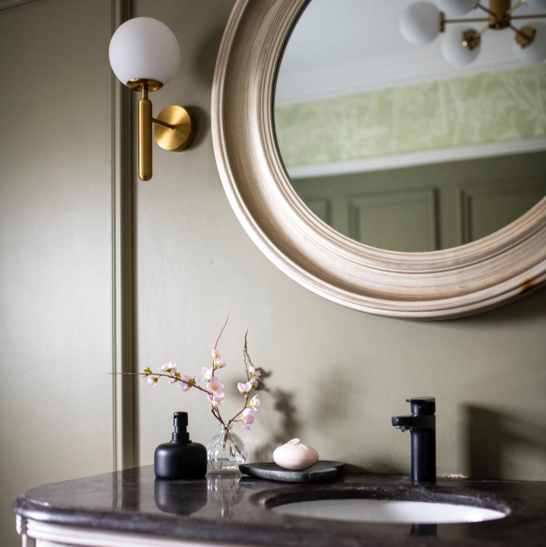 KANYE Distressed silver round mirror with vintage-style frame.