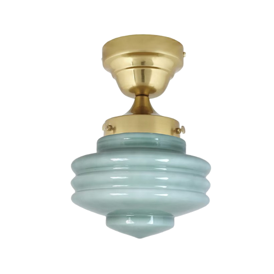 Semi-flush mount ceiling light with sage green opal glass shade and iron fixture.