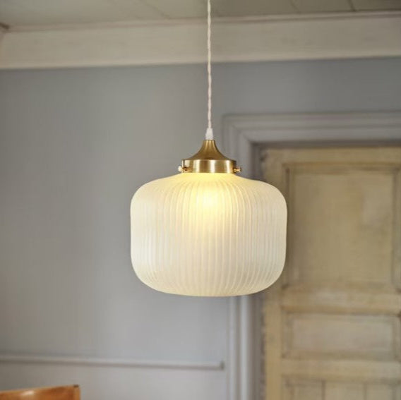 EVA pendant light with ribbed opal glass shade and satin brass-finished iron fixture.
