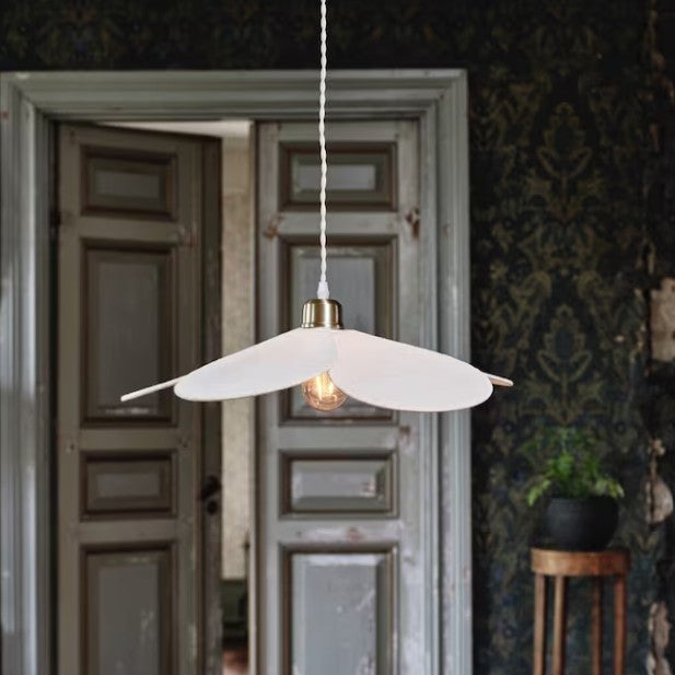 ISOBEL pendant light with petal-shaped cotton fabric shade and iron frame, perfect for soft and playful interiors.