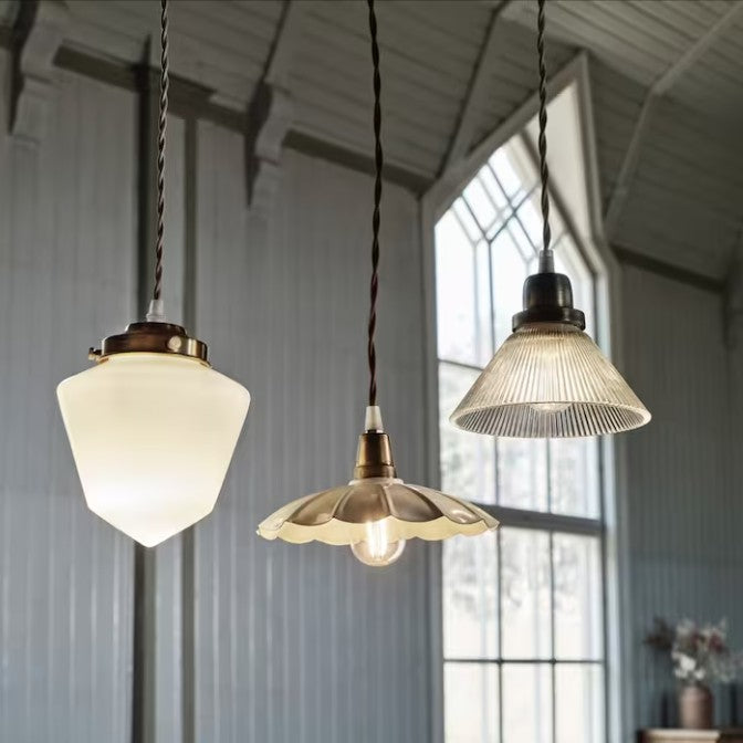 LORNA pendant light with ribbed glass shade and antique-style iron fixture, featuring a twisted fabric cable.